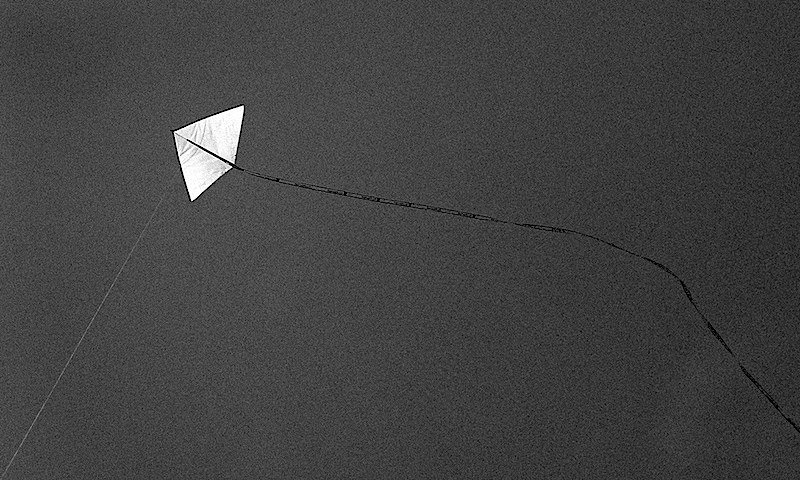 The little white kite in the deep blue sky, kite festival Potsdam.