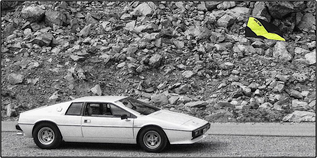 2 classics: sports car and lightwind kite: Lotus Esprit and urban ninja.